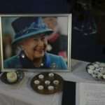 A book of condolence and photo of Queen Elizabeth II
