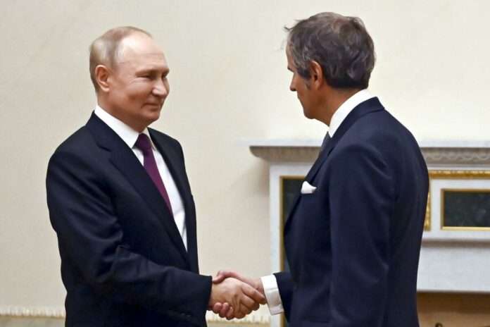 Russian President Vladimir Putin and IAEA Director General Rafael Mariano Grossi