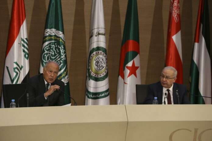 Algerias Foreign Minister Ramtane Lamamra right and Arab League Secretary General Ahmed Aboul Gheit