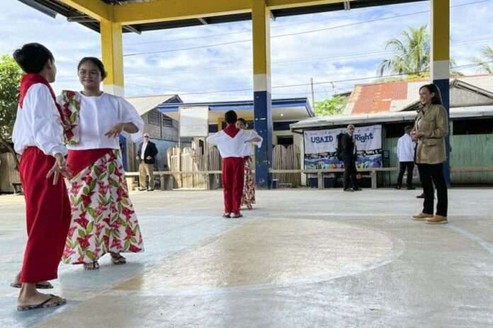 Kamala Harris watches performers during her visit to Puerto Princesa Palawan