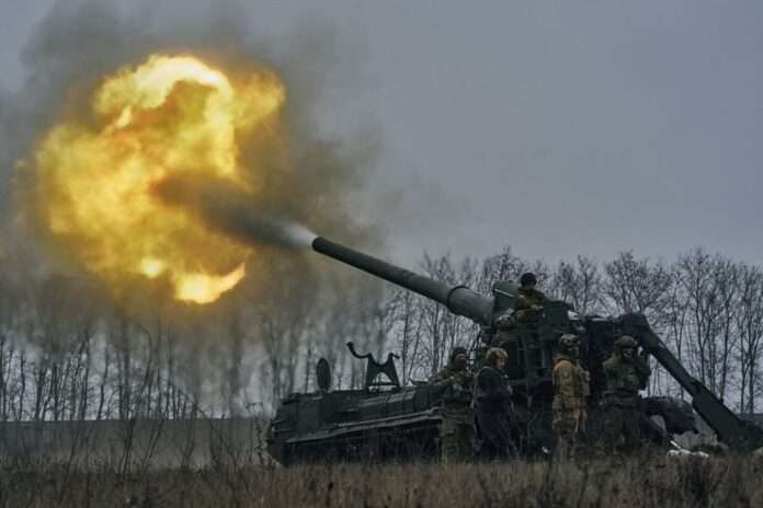 Ukrainian soldiers fire a Pion artillery system at Russian positions near Bakhmut Donetsk region